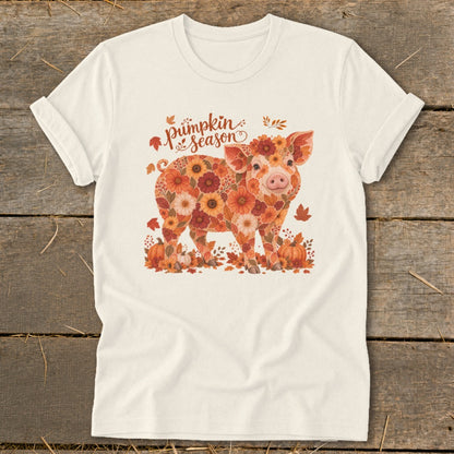 T-shirt with floral pig and "Pumpkin Season" text surrounded by autumn leaves and pumpkins.