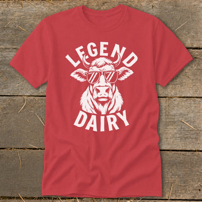 Red t-shirt with white graphic of a cow wearing sunglasses and text "LEGEND DAIRY".