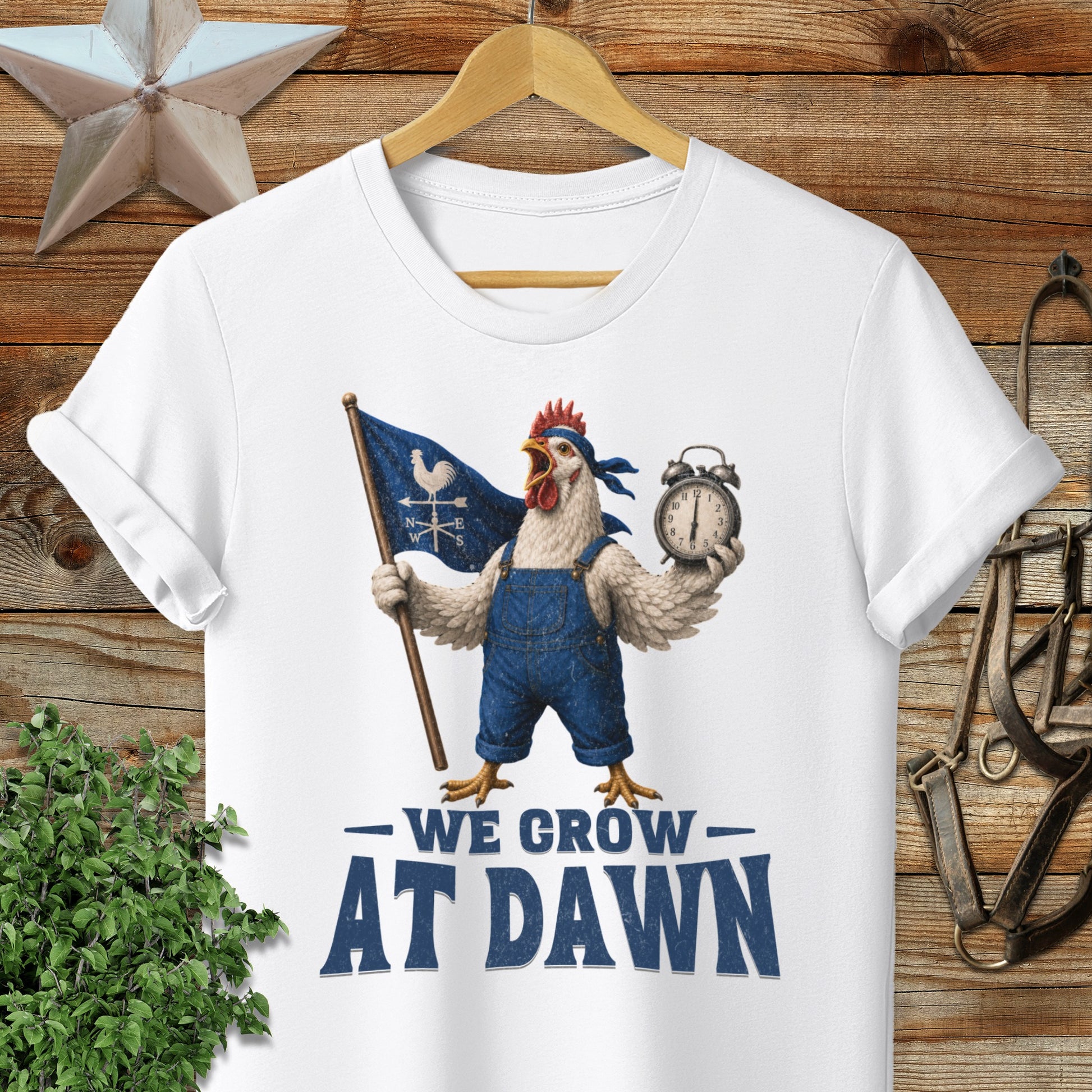 Chicken in overalls holding a flag and alarm clock with "We Grow At Dawn" text.