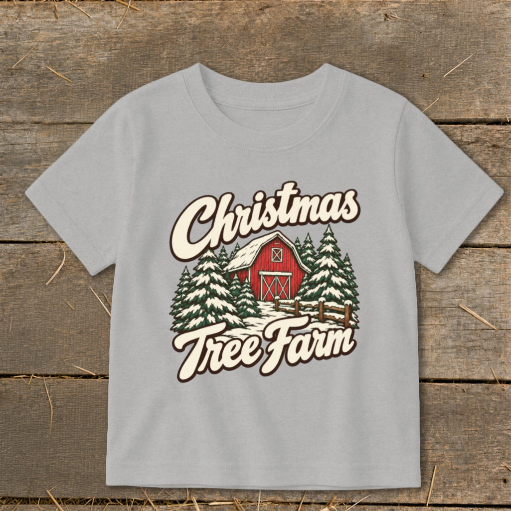 Light grey t-shirt with "Christmas Tree Farm" graphic and a red barn and trees.