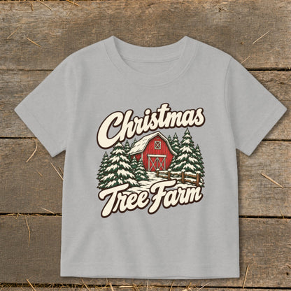 Light grey t-shirt with "Christmas Tree Farm" graphic and a red barn and trees.