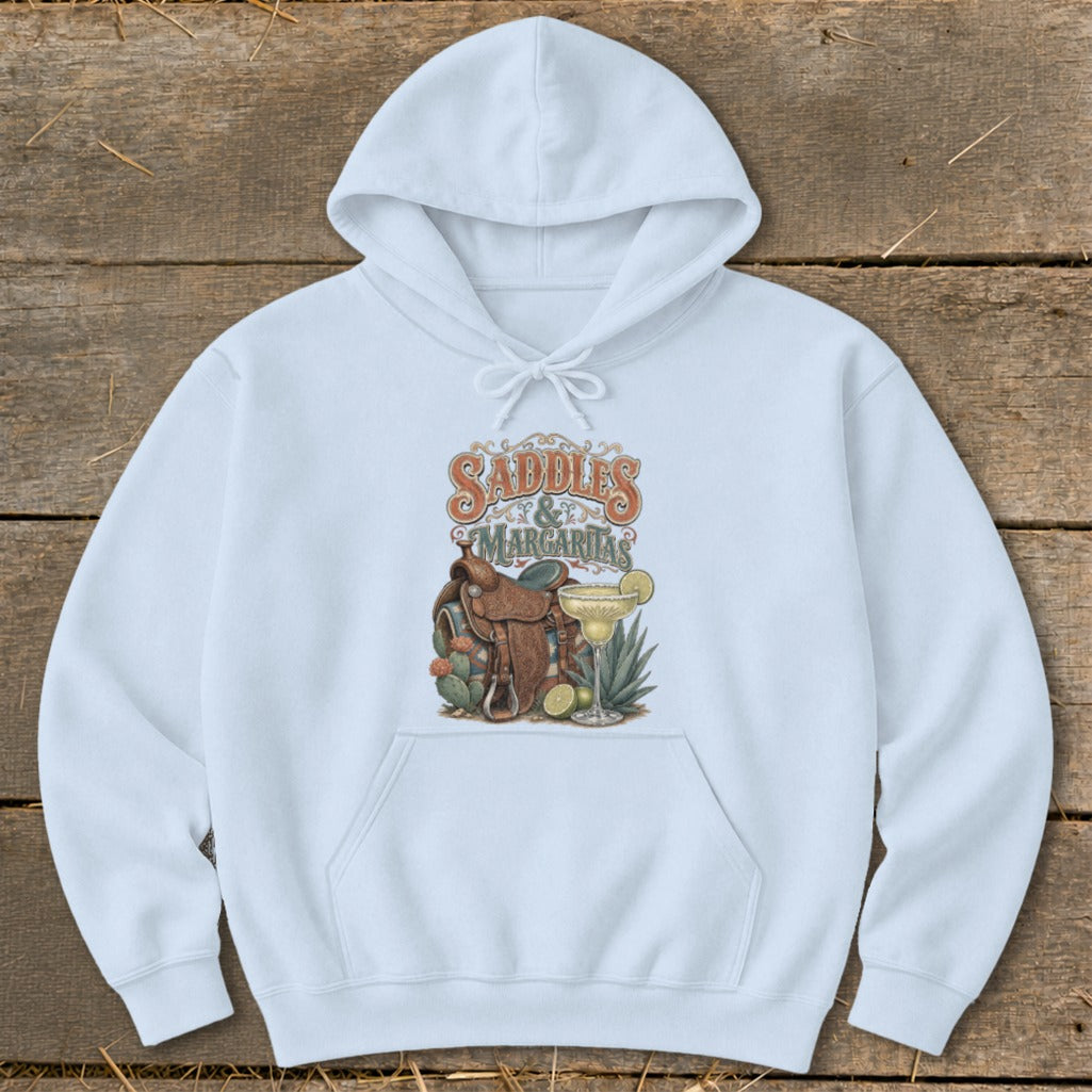 White hoodie with "Saddles & Margaritas" graphic featuring a saddle, margarita, and cacti.