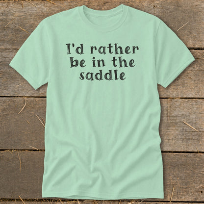 Mint t-shirt with black text that reads "I'd rather be in the saddle."