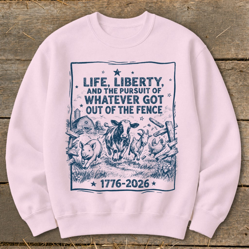 Light pink crewneck sweatshirt with graphic of farm animals escaping a fence.