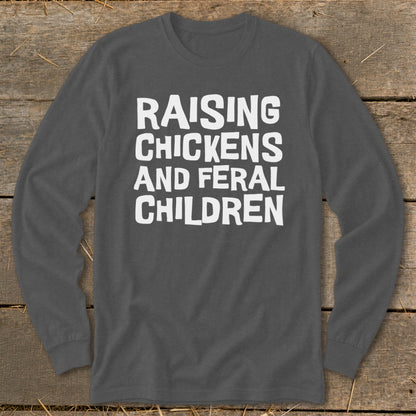 Dark grey long-sleeve shirt with white text "RAISING CHICKENS AND FERAL CHILDREN".