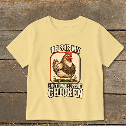 Yellow t-shirt with a chicken graphic that says "This is my Emotional Support Chicken".