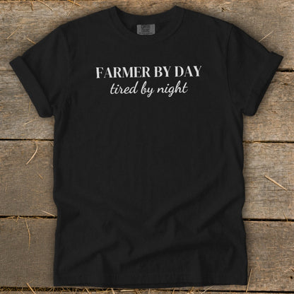 Black t-shirt with "FARMER BY DAY tired by night" text.