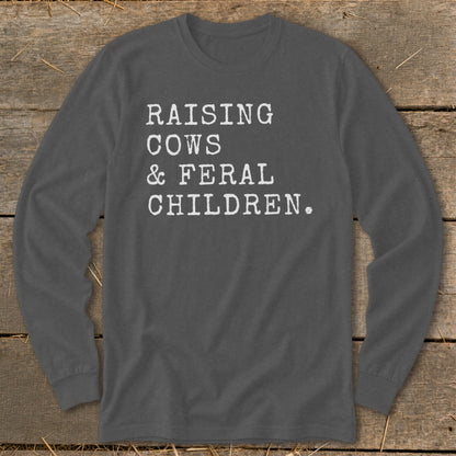 Charcoal long sleeve shirt with white text: Raising Cows & Feral Children.