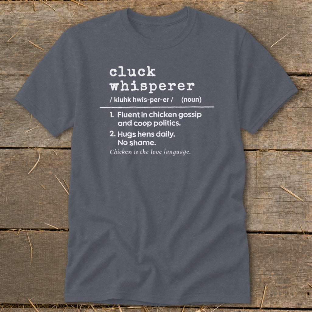 Dark grey t-shirt with "Cluck Whisperer" definition and chicken humor.