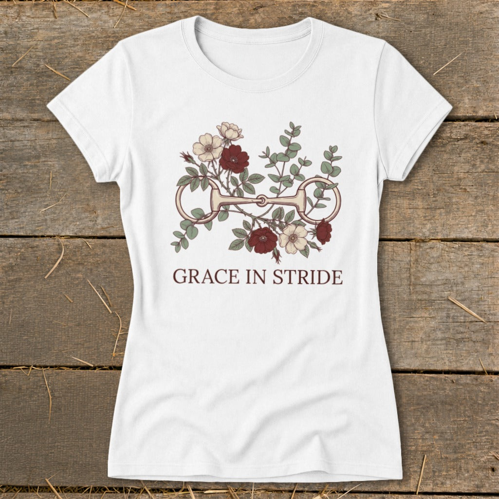 White t-shirt with floral and bit design, text "Grace in Stride".