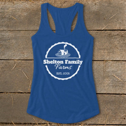 Blue tank top with Shelton Family Farms logo and established date.