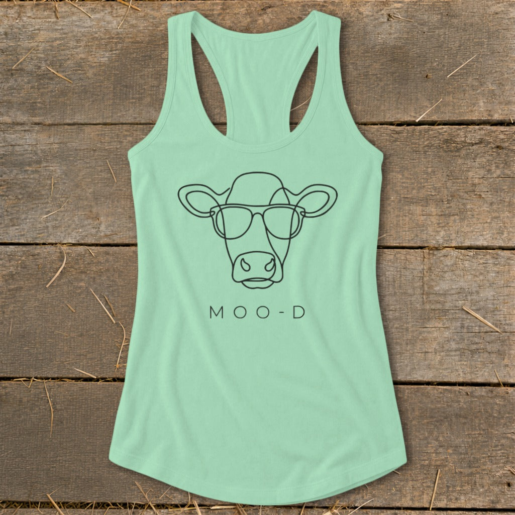 Mint green tank top with a black outline of a cow wearing sunglasses and text "MOO-D".