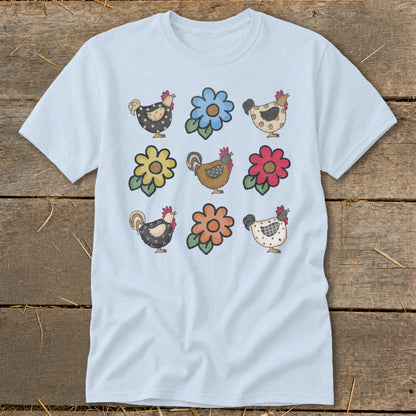 Light blue t-shirt with a grid of six cartoon chickens and six cartoon flowers.