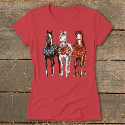 Red t-shirt with three horses wearing patriotic bandanas and bows.