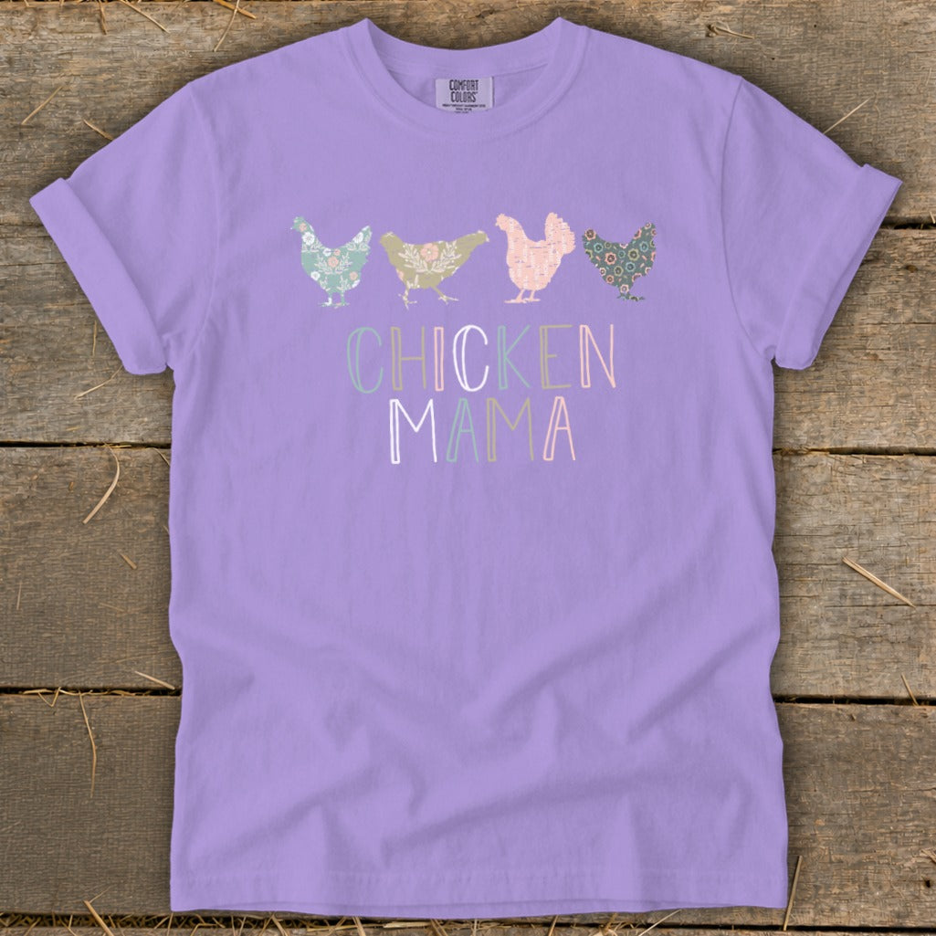 Purple t-shirt with four floral patterned chickens and "CHICKEN MAMA" text.