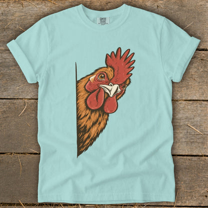 Light blue t-shirt featuring a peeking rooster illustration.