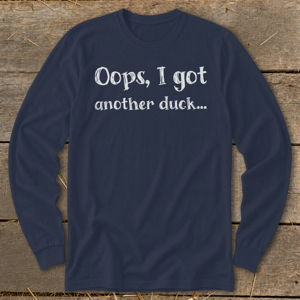 Navy long-sleeve shirt with white text "Oops, I got another duck..."