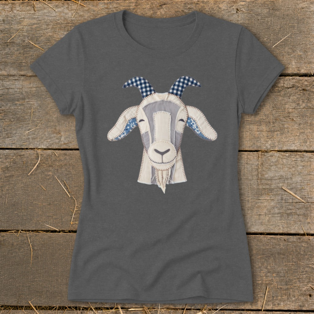 Gray t-shirt featuring a fabric applique of a goat's face with blue checkered horns.