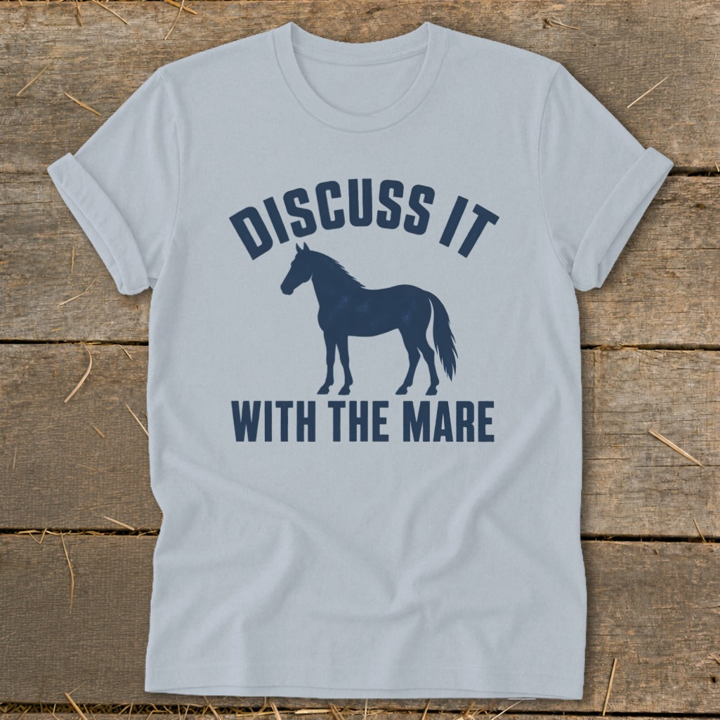 Light blue t-shirt with dark blue text and horse silhouette reading "Discuss It With The Mare".
