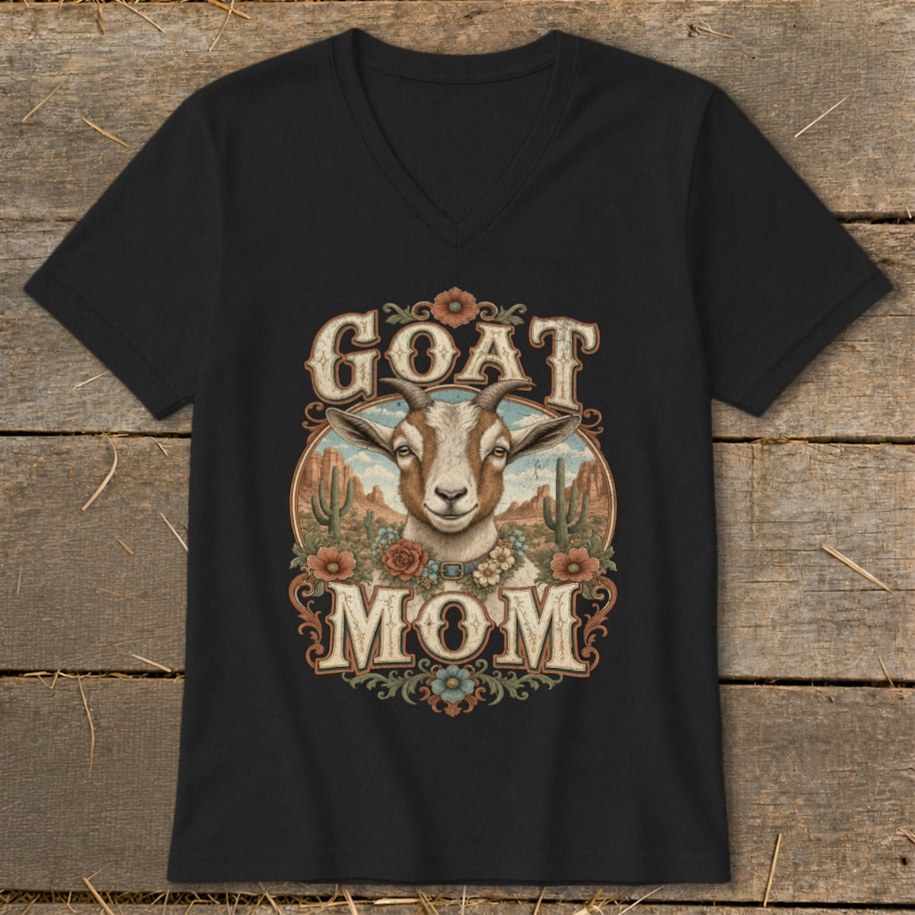 Black t-shirt with "GOAT MOM" text and a goat in a desert scene.