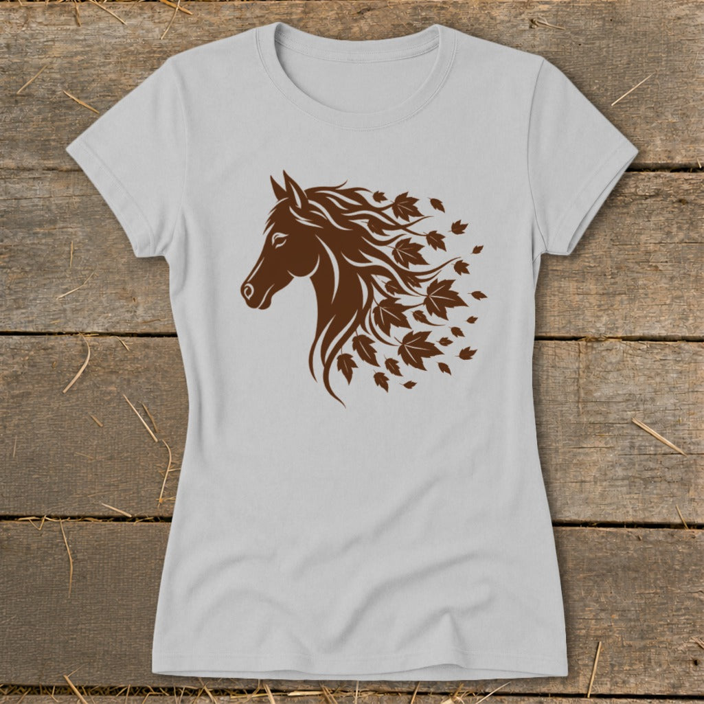 Brown horse head with flowing mane made of leaves on a light grey t-shirt.