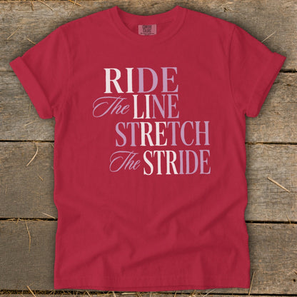Red t-shirt with "RIDE The LINE STRETCH The STRIDE" text.