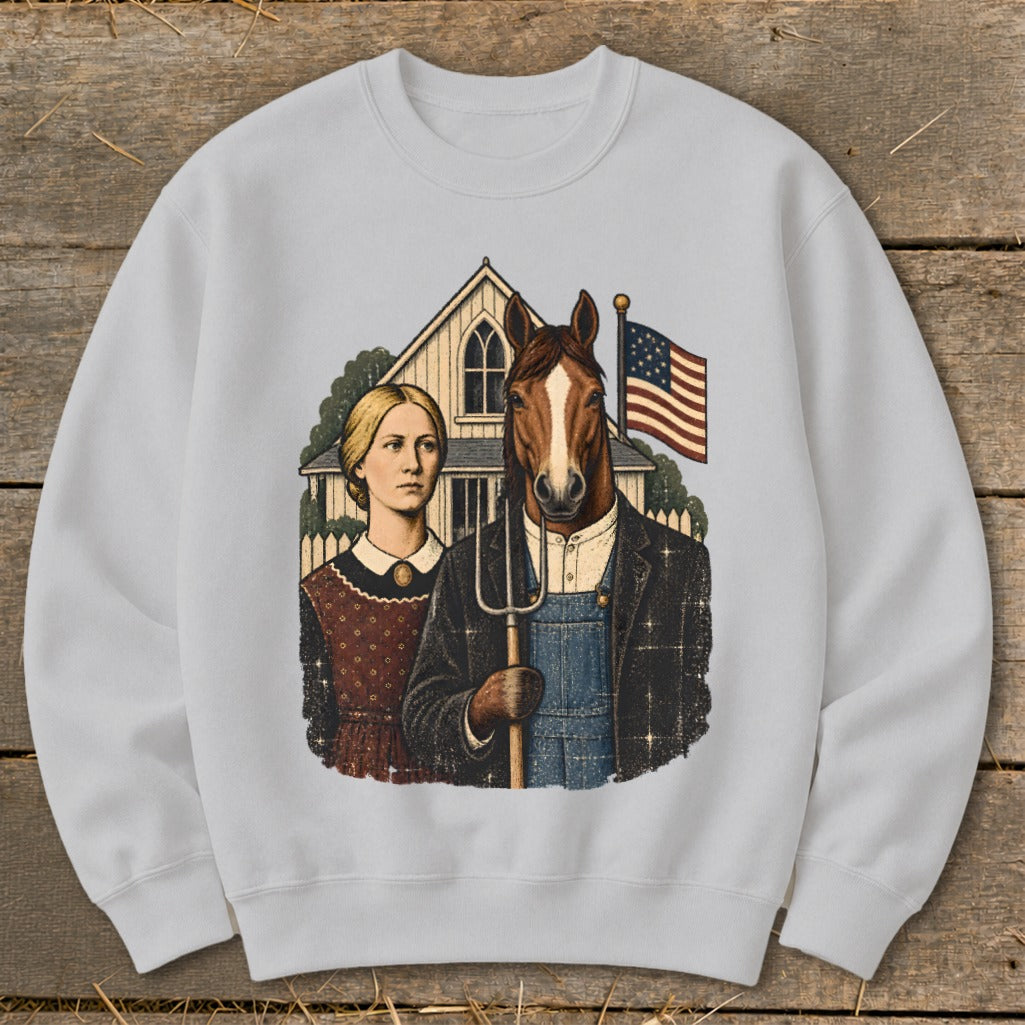 Light gray crewneck sweatshirt featuring a parody of American Gothic with a horse holding a pitchfork.