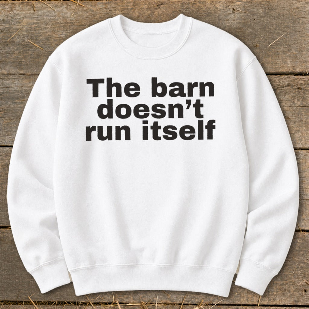 White sweatshirt with black text "The barn doesn't run itself"