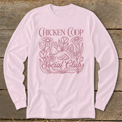 Pink long-sleeve shirt with "Chicken Coop Social Club" text and a chicken graphic.