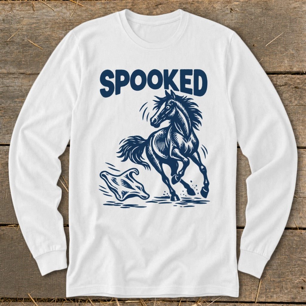White long-sleeve shirt with "SPOOKED" text and a startled horse running from a ghost.