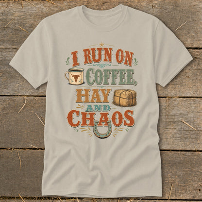 T-shirt graphic with text "I run on coffee, hay and chaos" and accompanying images.