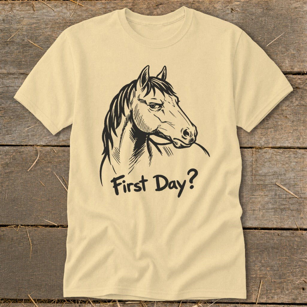 Cream t-shirt with black line drawing of a horse's head and the text "First Day?".