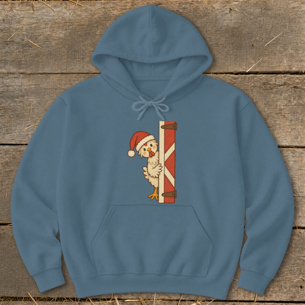 Blue hoodie with a cartoon chicken wearing a Santa hat peeking around a barn door.