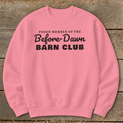 Pink crewneck sweatshirt with black text reading "Proud Member of the Before-Dawn Barn Club."