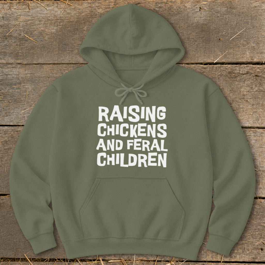 Olive green hoodie with white text that reads "RAISING CHICKENS AND FERAL CHILDREN."