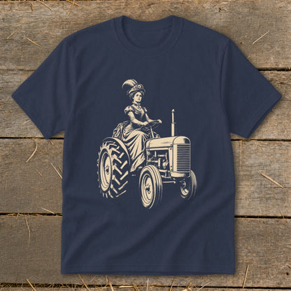 Illustration of a woman in Victorian dress driving a tractor on a navy shirt.