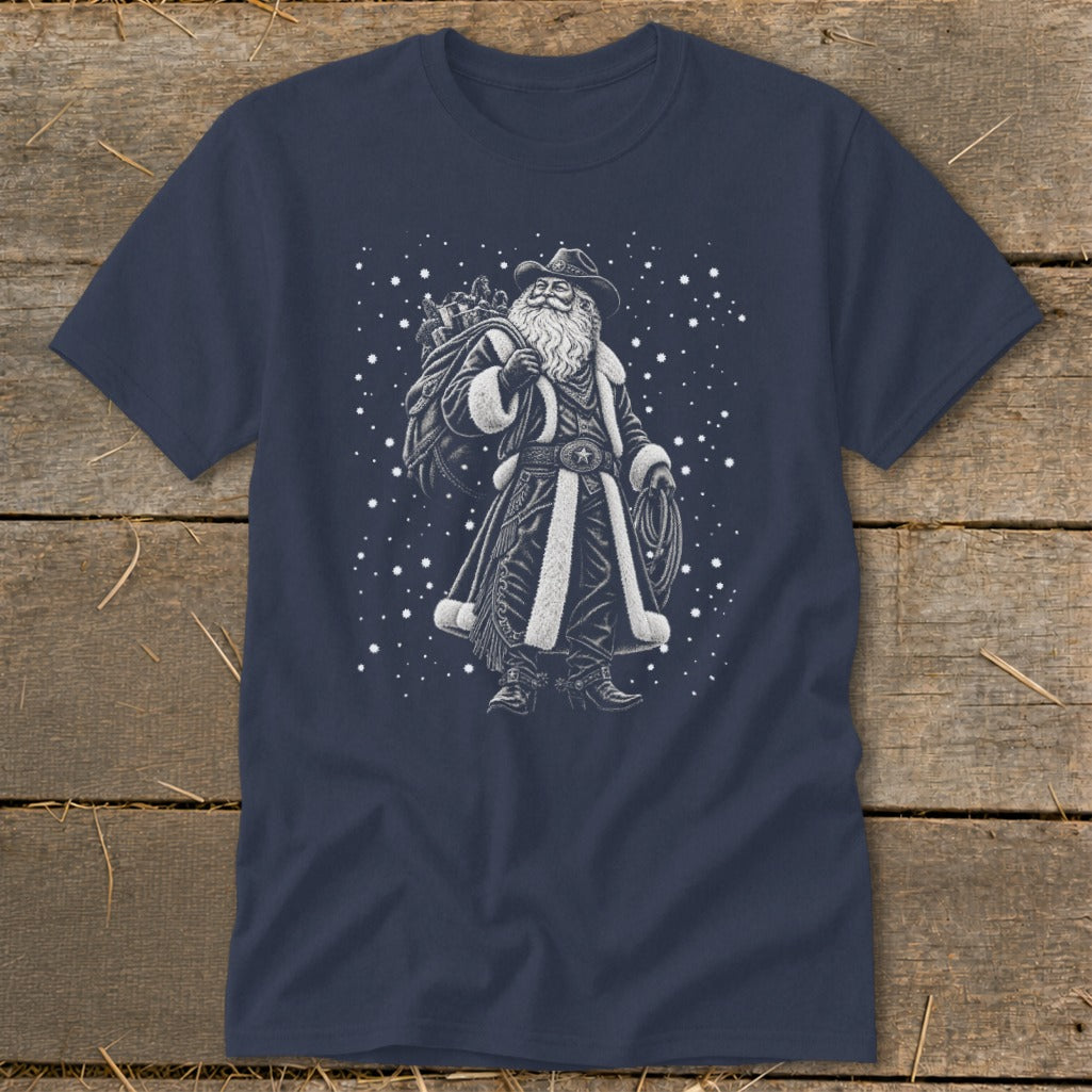 T-shirt with a cowboy Santa Claus graphic holding a gift sack and a lasso.
