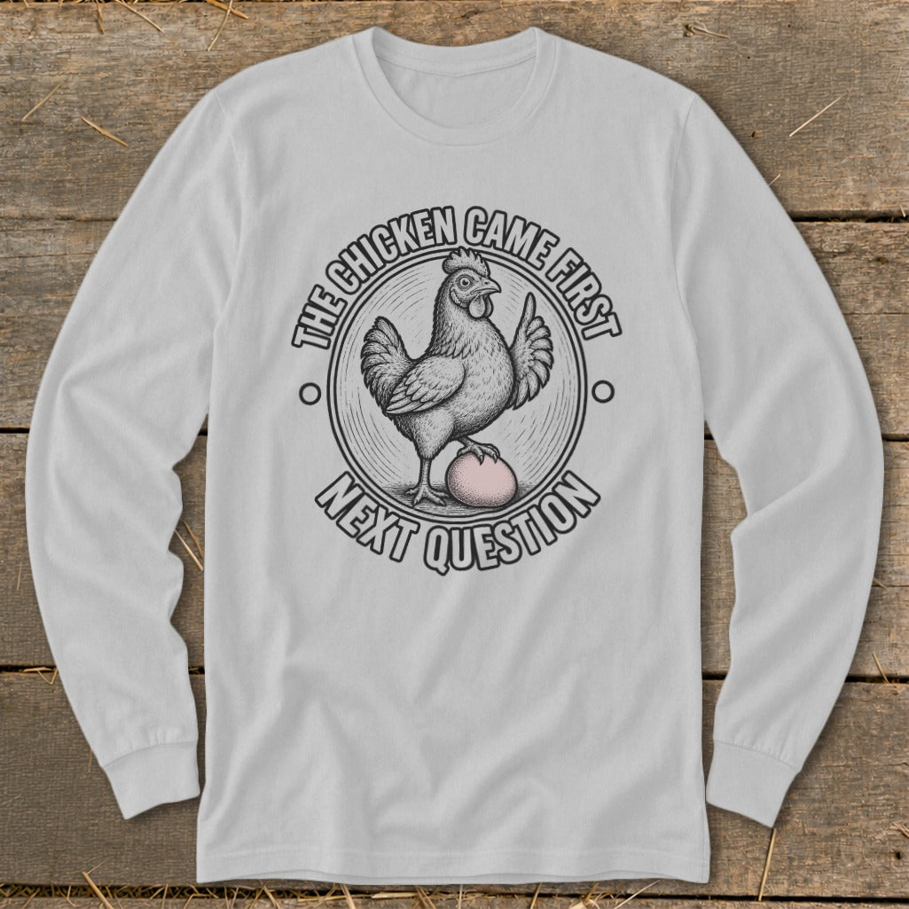 Long sleeve shirt with "The chicken came first, next question" text and chicken graphic.