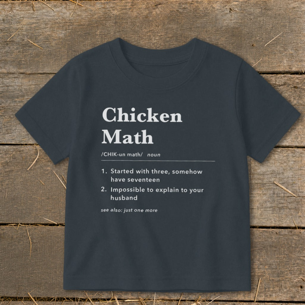 Dark gray t-shirt with "Chicken Math" definition and humorous explanation.
