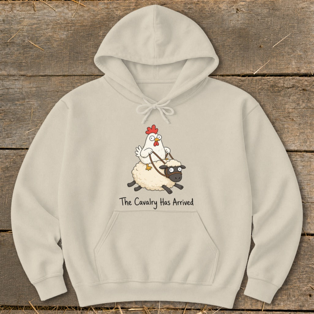 Light beige hoodie with a cartoon chicken riding a sheep, text reads "The Cavalry Has Arrived."
