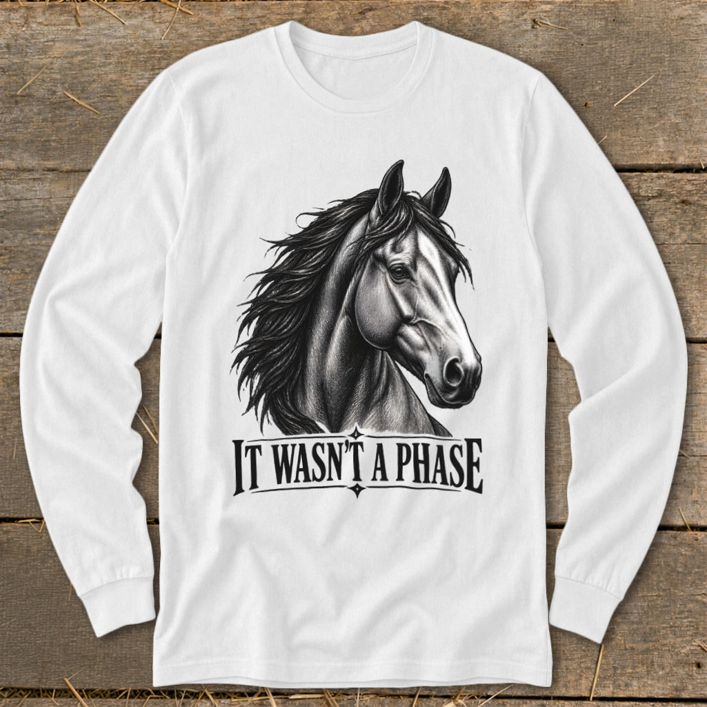 White long-sleeve shirt with a detailed horse illustration and text "IT WASN'T A PHASE".