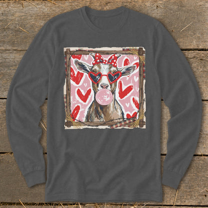 Goat wearing heart sunglasses and a bow blows bubblegum, with hearts in the background.
