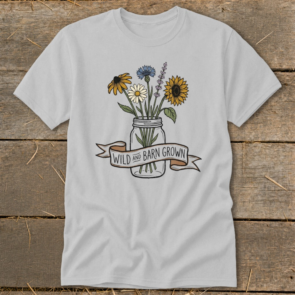 Light gray t-shirt with a mason jar of wildflowers and "WILD AND BARN GROWN" banner.