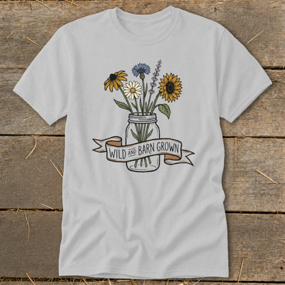 Light gray t-shirt with a mason jar of wildflowers and "WILD AND BARN GROWN" banner.