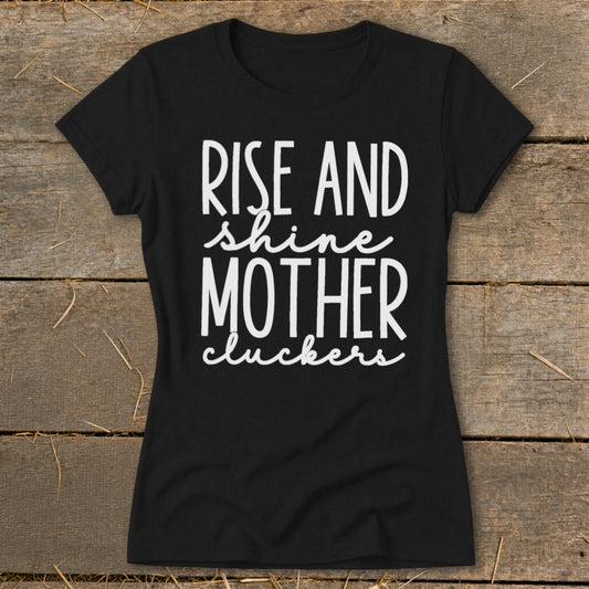 Black t-shirt with "Rise and shine mother cluckers" white text.