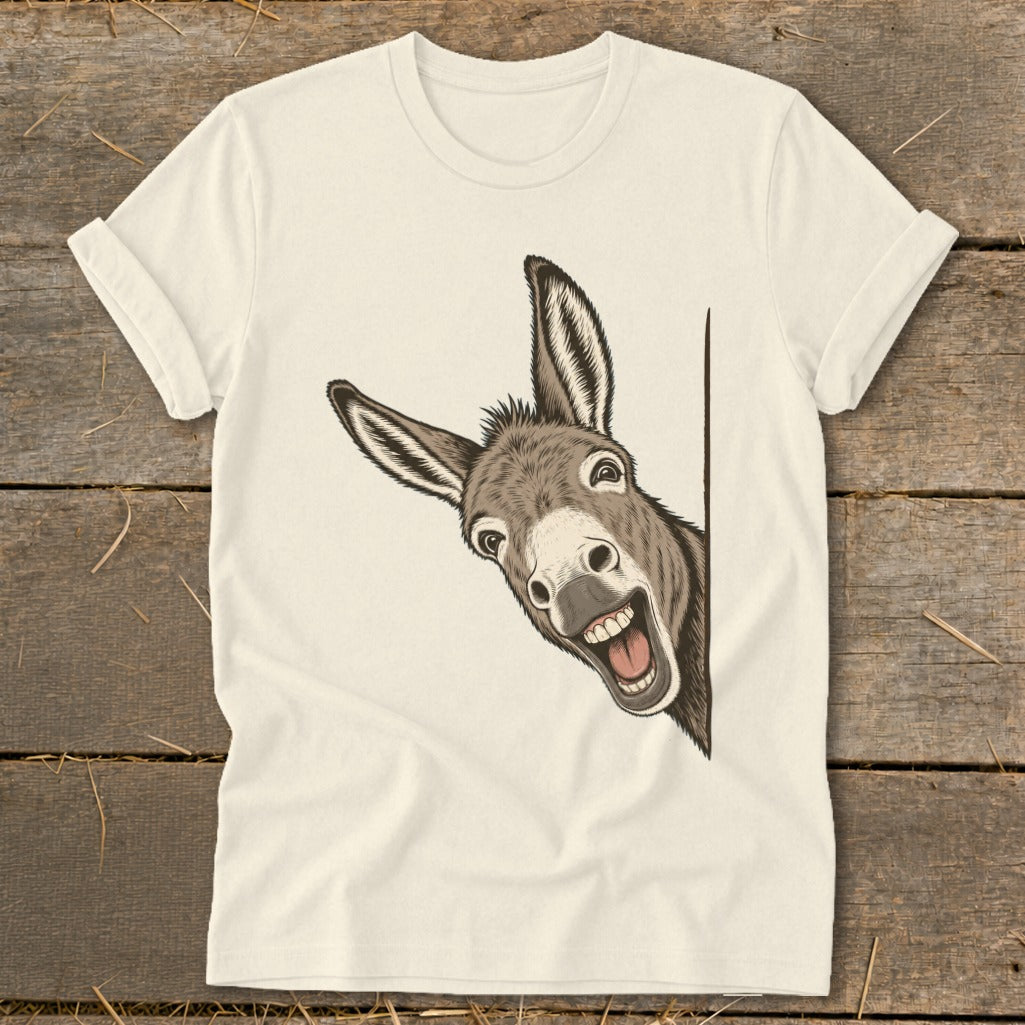 Cream t-shirt with a grinning donkey peeking from the side.