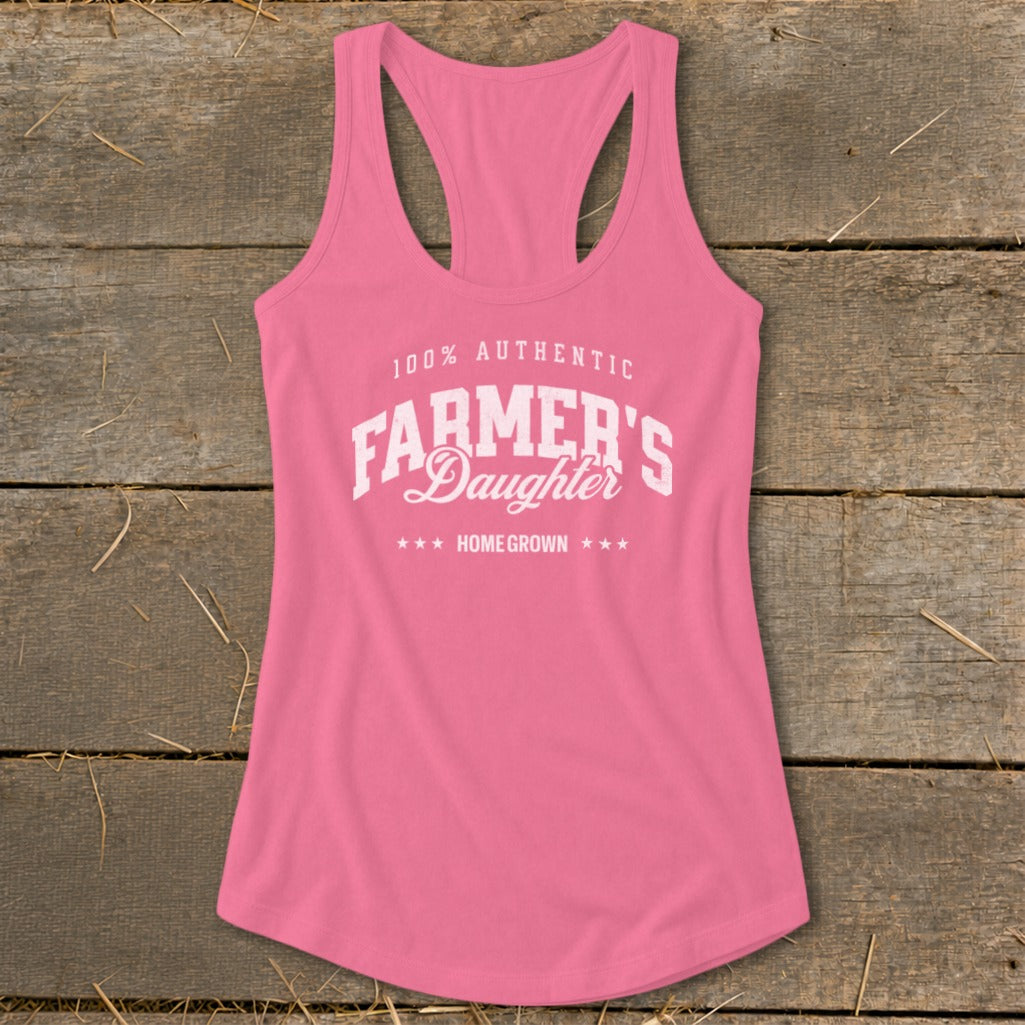 Pink racerback tank top with "100% Authentic Farmer's Daughter Home Grown" text.