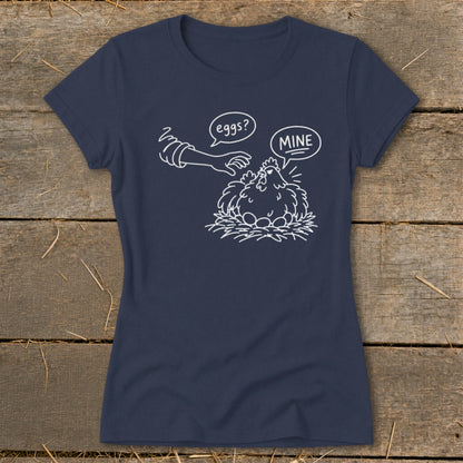 Navy t-shirt with cartoon chicken on nest asking "eggs?" and saying "MINE".