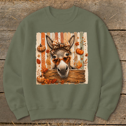 Crewneck sweatshirt with a cute donkey wearing heart sunglasses and a plaid bow.
