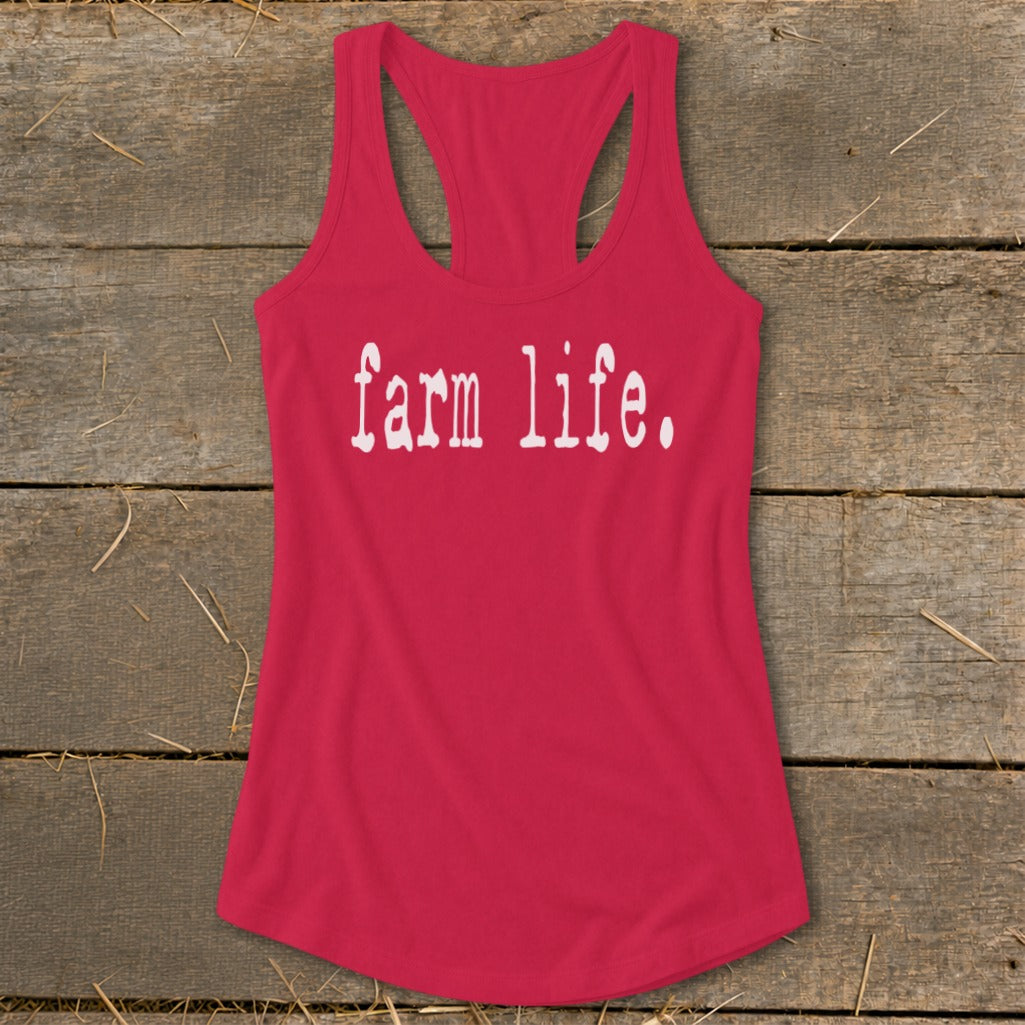 Pink racerback tank top with "farm life." text.